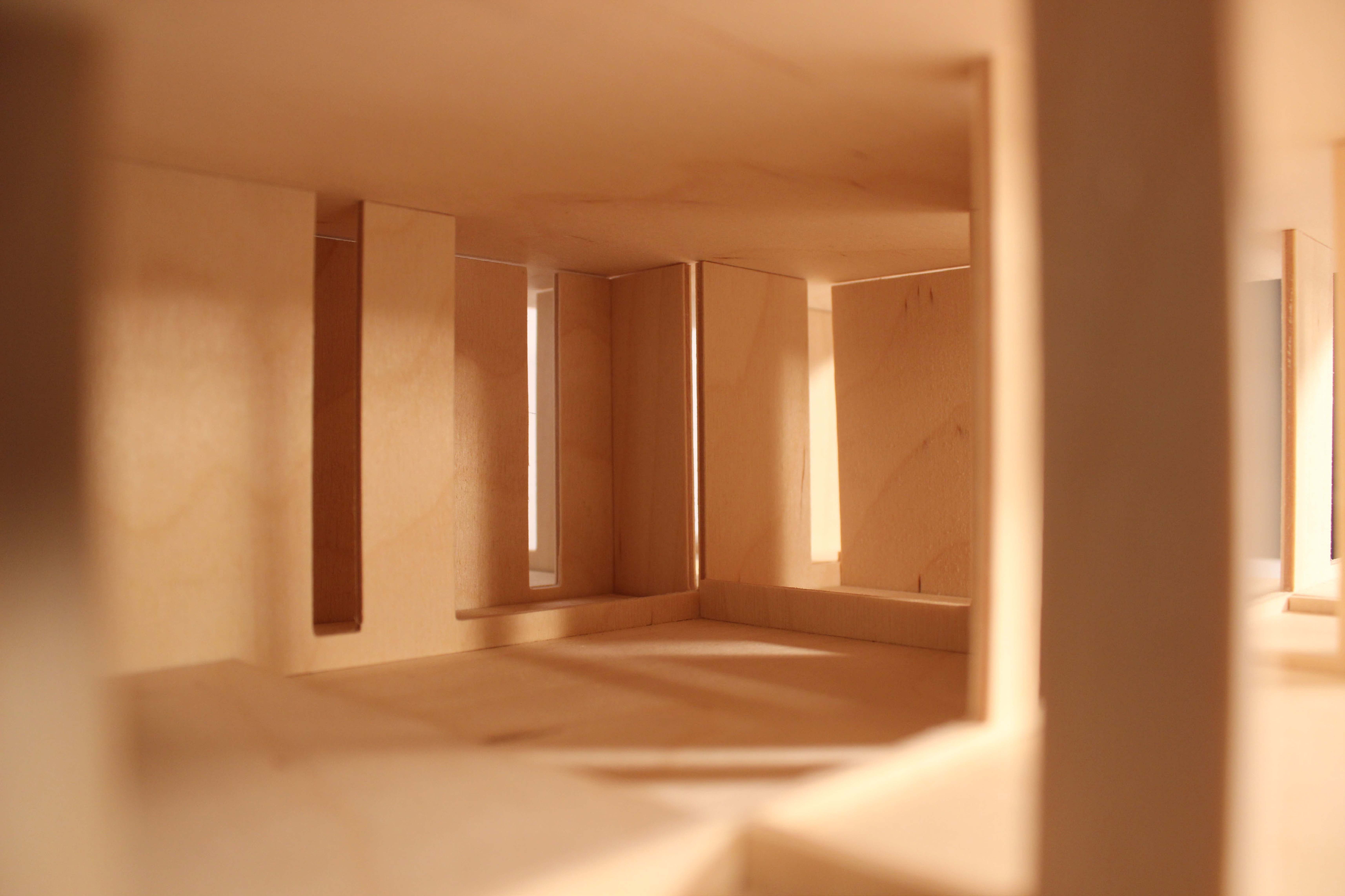 Wood interior structure with different layers of rectangle design with curvy angles. 
